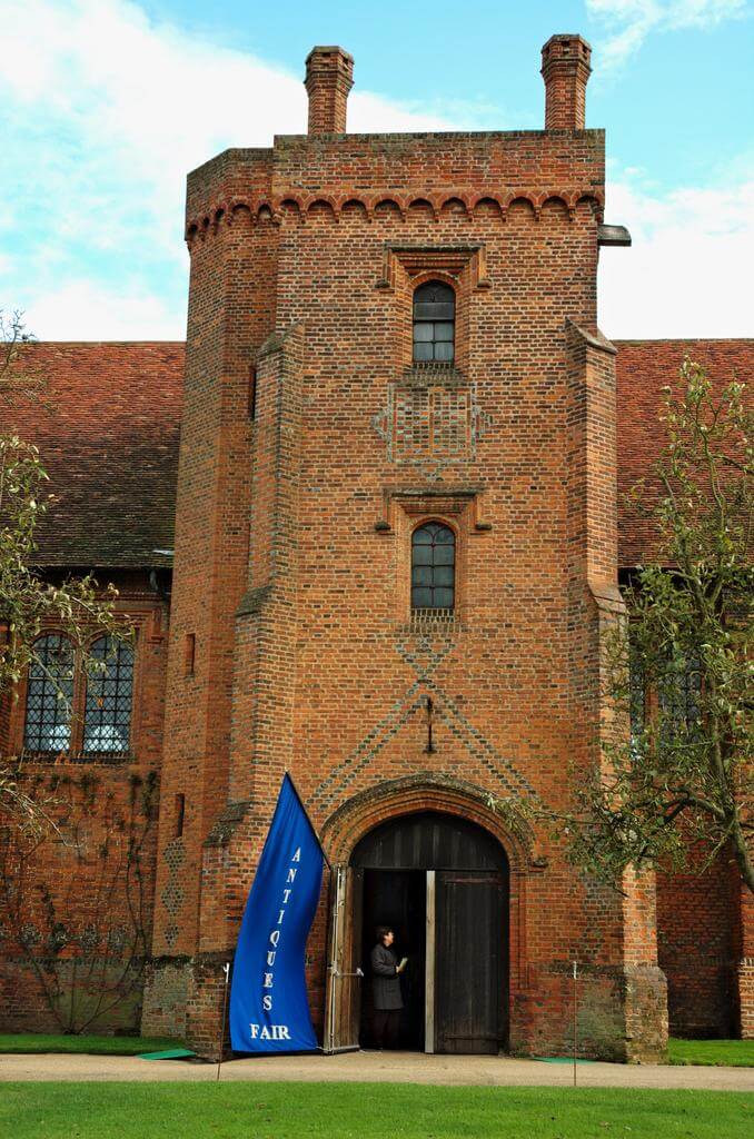 The front of the Hatfield House in red brick in Hertfordshire, England.